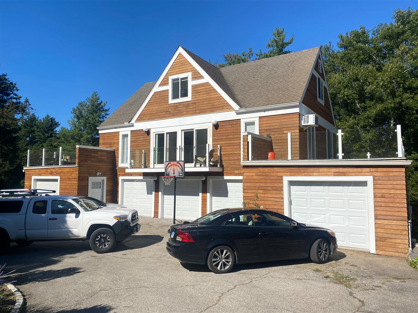 Exterior painting on a cedar-sided home in Connecticut